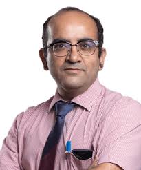 Dr. Manish Munjal